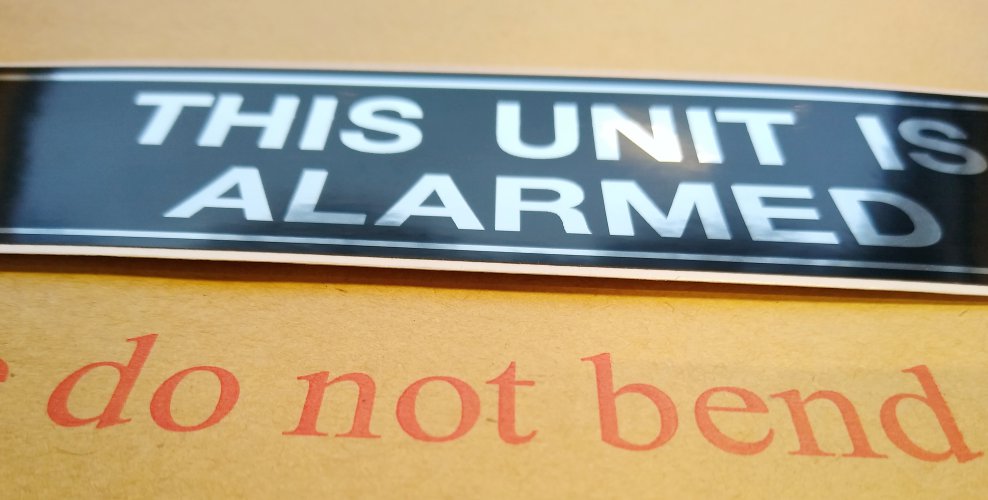 THIS UNIT IS ALARMED