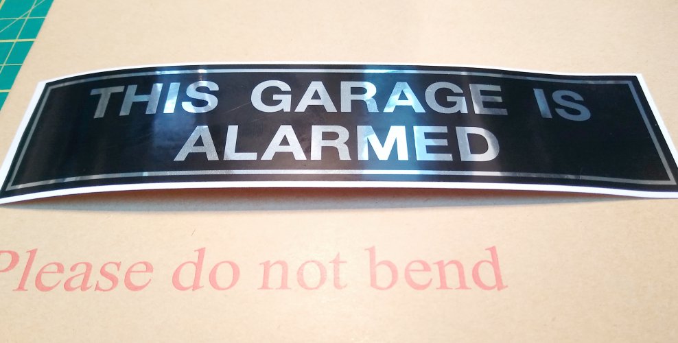 THIS GARAGE IS ALARMED