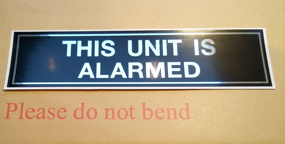 THIS UNIT IS ALARMED